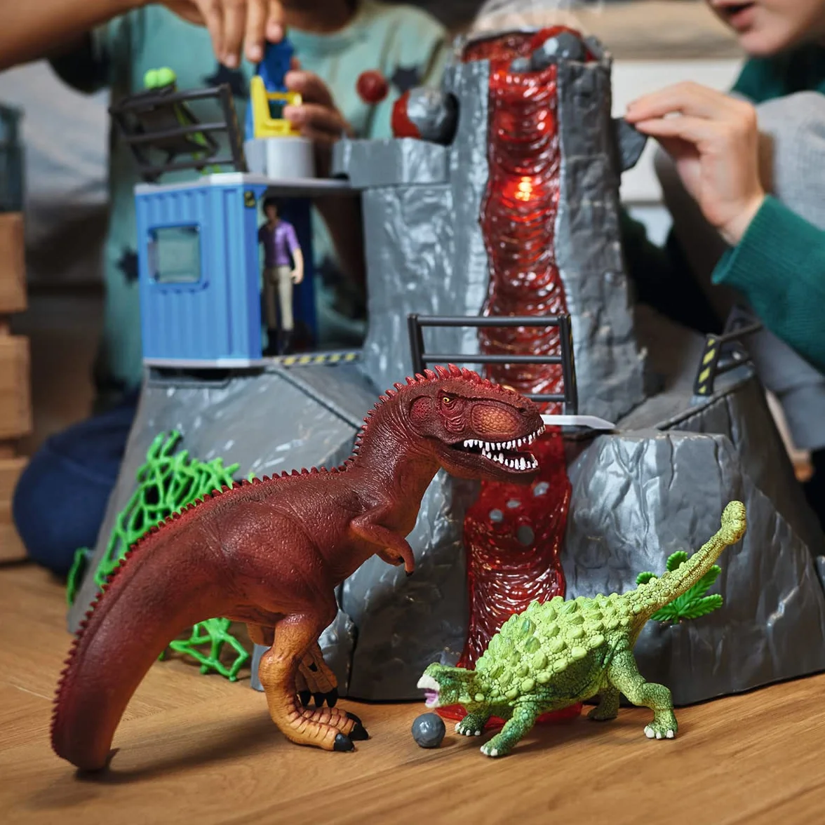 SCHLEICH DINOSAURS 42564 - Set di giocattoli a forma di dinosauro, con vulcano con luce LED e funzione di scoppio, figura ricercatrice e 2 figure di dinosauro, età consigliata: 5-12 anni
