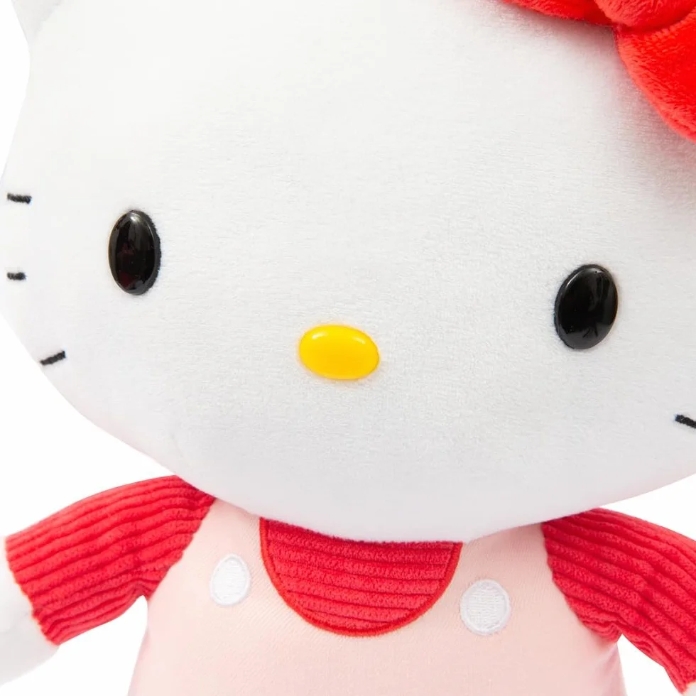 Hello Kitty Giochi Preziosi Morbido Peluche Hello Kitty 30 cm con Outfit alla Moda, Gonna in Jeans, Fiocco Rosa e Maglia A Righe Rosa Adatto per Bambini dai 3 Anni